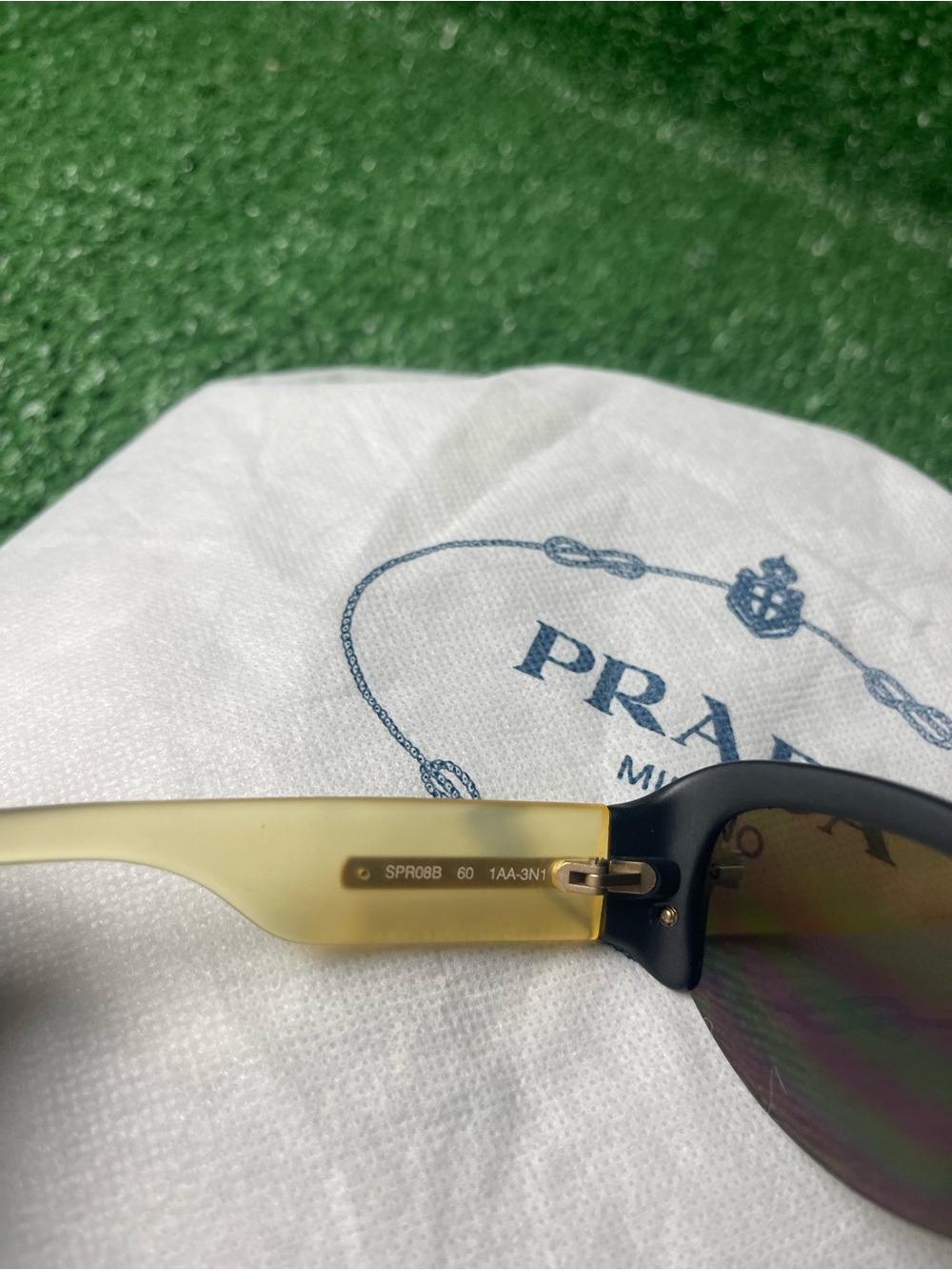 Prada Two-Tone Cat Eye Sunglasses in Black and Yellow - Picture 9 of 15